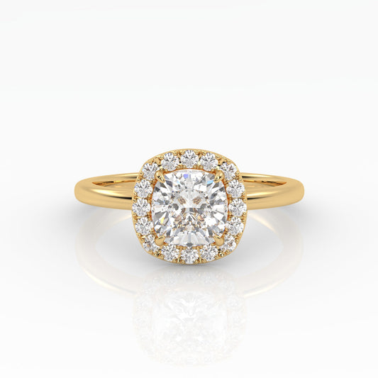 An exquisite yellow gold cushion-cut diamond ring featuring 1 carat diamond in a halo setting.