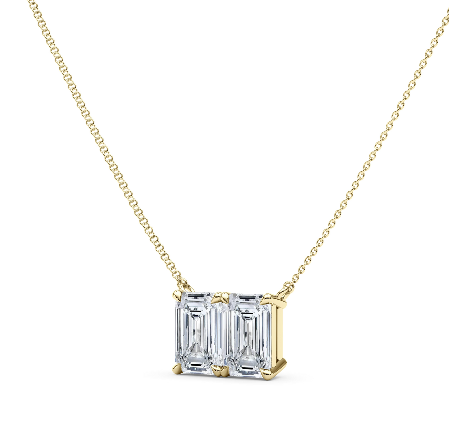 Kaksoissmaragdi pohjois-etelä-timanttiriipus ketjulla